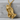 Folded Prayer Hands Pendant, gold vermeil, product photo on stone pedestal