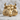 Taurus Bull Head Ring, gold vermeil, front view on stone surface