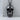 Human Skull Pendant, black rhodium, front view on display pedestal