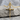 Bound Nail Cross Pendant, gold vermeil, product photo on stone surface