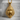 Silverback Gorilla Pendant, gold vermeil, front view on stone base
