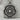 Tudor Rose Pendant, oxidized silver, front view on stone display
