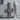 Jesus Face Cross Pendant, oxidized silver, front view on stone