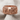 Skull Rose Band Ring, rose gold, angled product photo on fabric