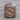 Pisces Twin Fish Zodiac Pendant, rose gold, front view on wood block