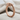 Tail biting dragon ring, rose gold finish, angled product photo