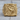 Three Headed Dragon Ring, gold vermeil finish on wood surface