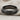 Rope Wedding Ring, black rhodium, angled view on fabric