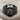 Boxer Dog Ring, black rhodium plated, front view on fabric background