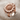 Sunflower Blossom Ring, rose gold, angled view on fabric background