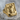 Joker signet ring, gold vermeil, angled front view on stone