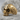 Clown Skull Ring, gold vermeil, product photo on stone