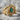 Twin dragon gemstone ring in gold vermeil on rock