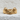 Smiling Frog Ring, gold vermeil, front view on textured surface