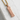 Bushido Kanji Bar Pendant in rose gold finish on stone surface