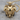 Tusked Elephant Pendant, gold vermeil, front product photo on wood