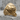 Alien Symbiote Ring, gold vermeil, front view on stone surface