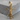 Da Vinci Vitruvian Man Earring, gold vermeil, product photo on stone