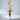 Celtic Knot Sword Earring, gold vermeil, front view on textured stone
