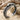 Serpent Ridged Coil Bracelet, oxidized silver, studio product photo