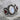 Moonstone Garnet Triptych Ring, oxidized silver, product photo on stone