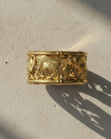 Detailed view of sterling silver bamboo border and tiger relief on handcrafted ring