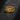 Gold vermeil howling wolf ring featuring mountain landscape and pine trees on dark stone background