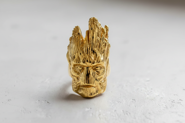 Front view of 14K gold vermeil Groot ring with intricate bark texture and expressive face detail