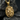 Close-up of premium handcrafted rhinoceros pendant resting on textured dark stone showing fine carved details
