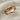 Ruby Eye Serpent Ring, rose plated silver, angled view showing scale texture