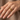 Handcrafted 14K gold vermeil barbed wire ring elegantly modeled on a woman's hand showing versatile styling