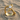Serpent Gemstone Ring, gold vermeil finish on beach sand