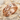 Celtic Braid Wedding Ring, rose gold, product view on sand