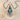Blue Stone Kite Pendant, oxidized, product photo on sand