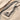 Close up side view of silver axe pendant showing detailed engravings on the blade and handle with oxidized finish