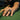 Lifestyle shot of handcrafted lion head ring worn on a man's hand while playing pool showing striking details