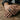 Oxidized silver Love Is Love ring worn on a man's hand showcasing the detailed sculptural relief and thick band