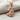 Goddess Maat Pendant, rose gold, product photo on fabric