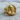 Angled side view of Benjamin Franklin ring showing the bold engraved GOD lettering and intricate gold vermeil detailing