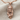 Butterfly Maiden Pendant, rose gold, product photo on linen