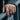 Lifestyle shot of oxidized silver phoenix ring worn on a man's hand showcasing the 3D sculpted flames and bird design.
