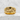 Capricorn Sea Goat Ring, gold vermeil, front view on stone pedestal