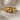 Double Knot Ring, gold vermeil, front view resting on natural linen fabric