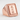 Bushido Signet Ring, rose gold, angled view on textured stone