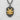 Close-up detail of the intricately sculpted 14K gold vermeil samurai helmet on the textured oxidized silver pendant