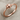 Celestial Sun Ring, rose gold, product photo on linen
