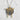 Close-up of the 925 sterling silver Torii Gate Pendant displaying the 14K gold vermeil casting on textured background