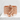 Ascending Koi Wave Ring, rose gold plated finish, front view on textured surface