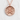 Kanji Beauty Pendant, rose gold, front view on white textured surface