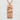 Great Wave Kanji Pendant, rose gold finish, front view on stone